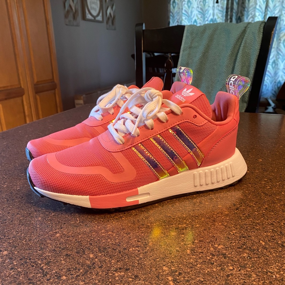 Woman’s Pink Adidas Tennis Shoes